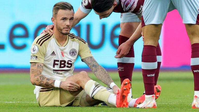 James Maddison awaits treatment before going off injured